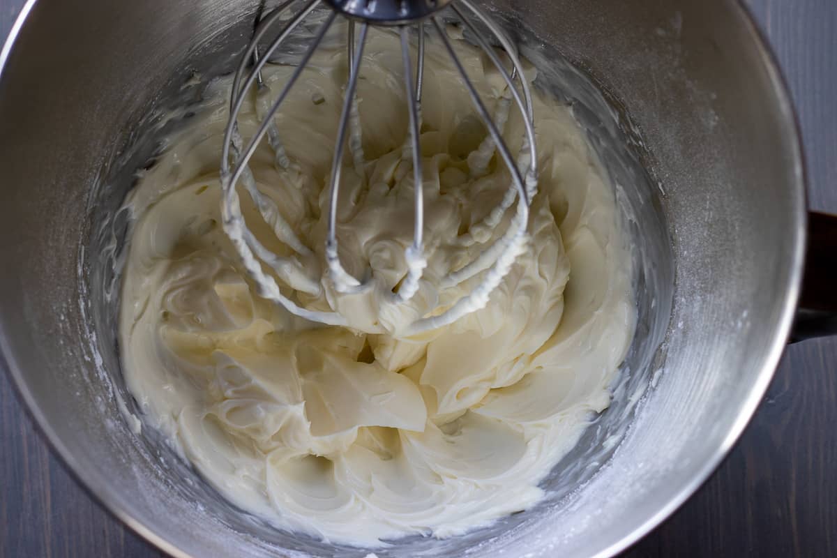 cream cheese and icing sugar are whisked until fluffy