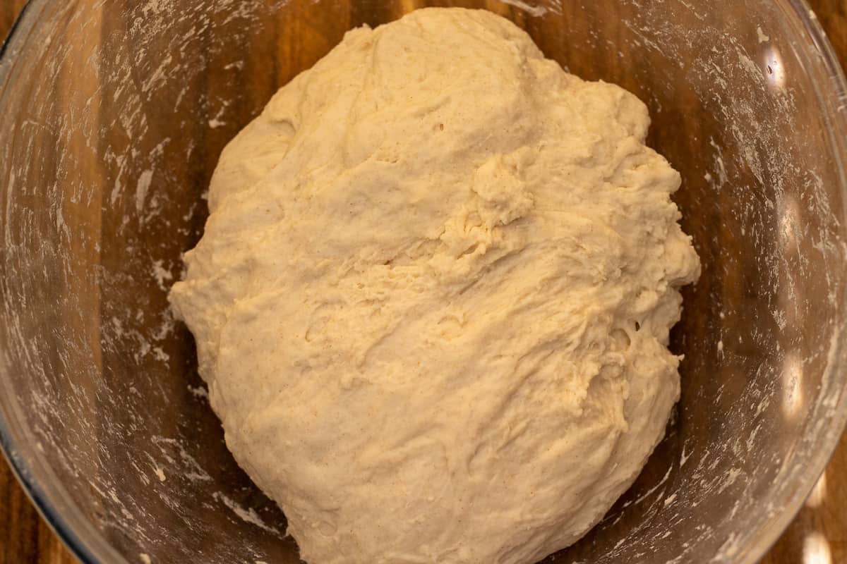 the dough for guyanese oil roti in a glass bowl