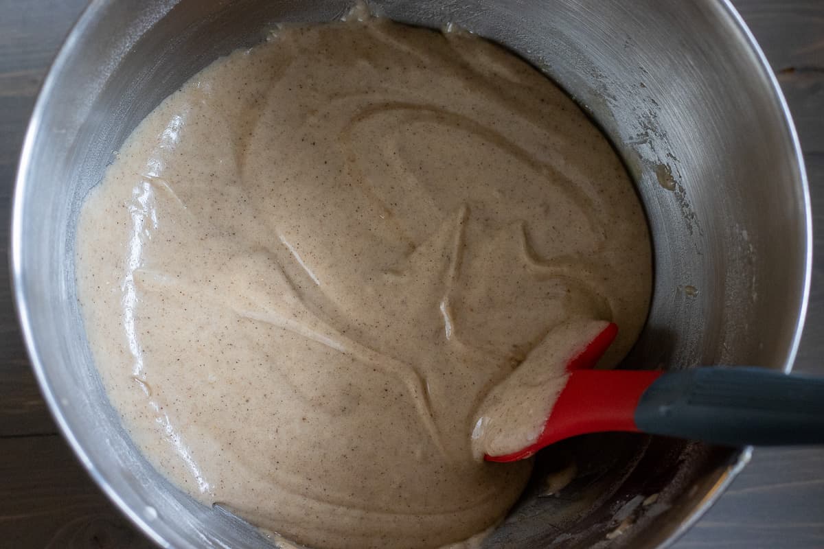 flour, spices, and baking soda is added to the wet mixture