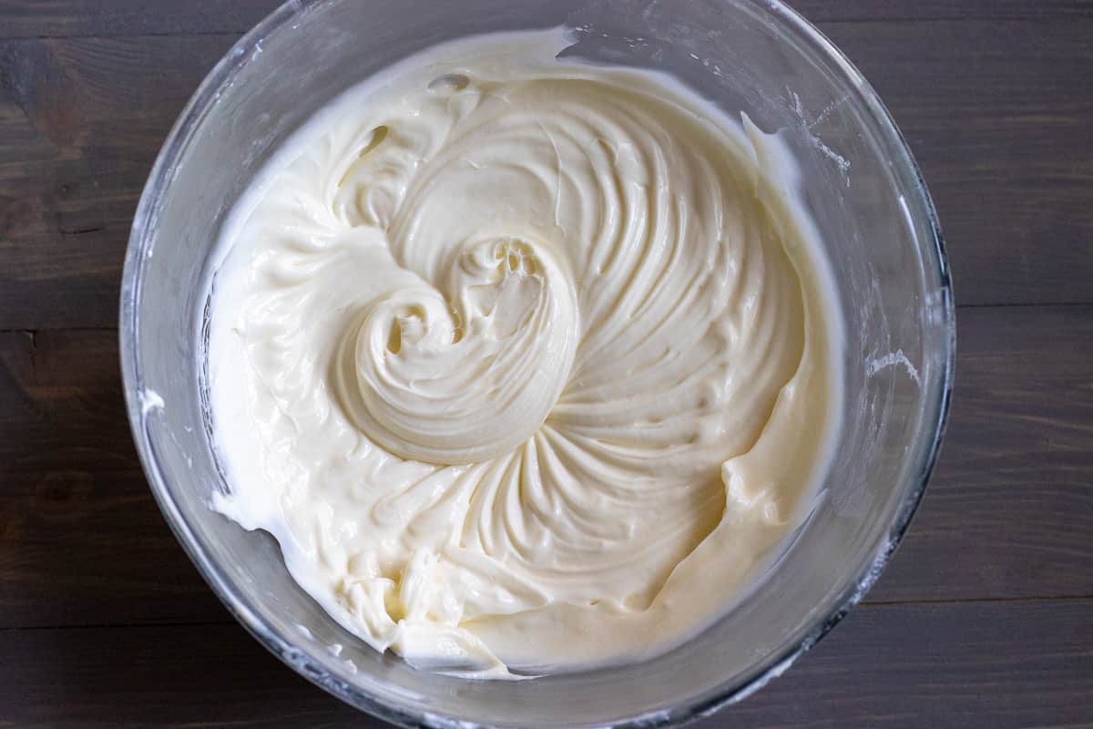 cream cheese frosting is beaten until light and fluffy