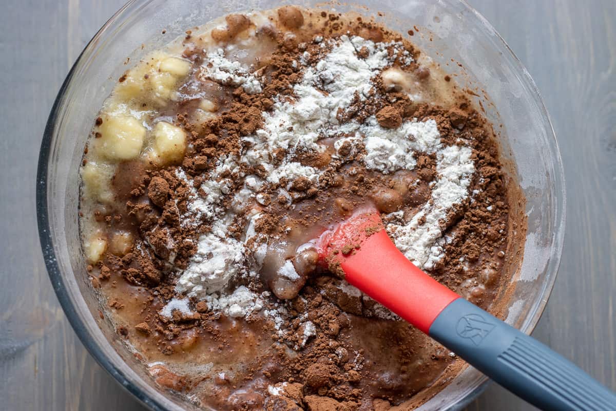 The dry ingredients are mixed with the wet ingredients to make the cake batter.