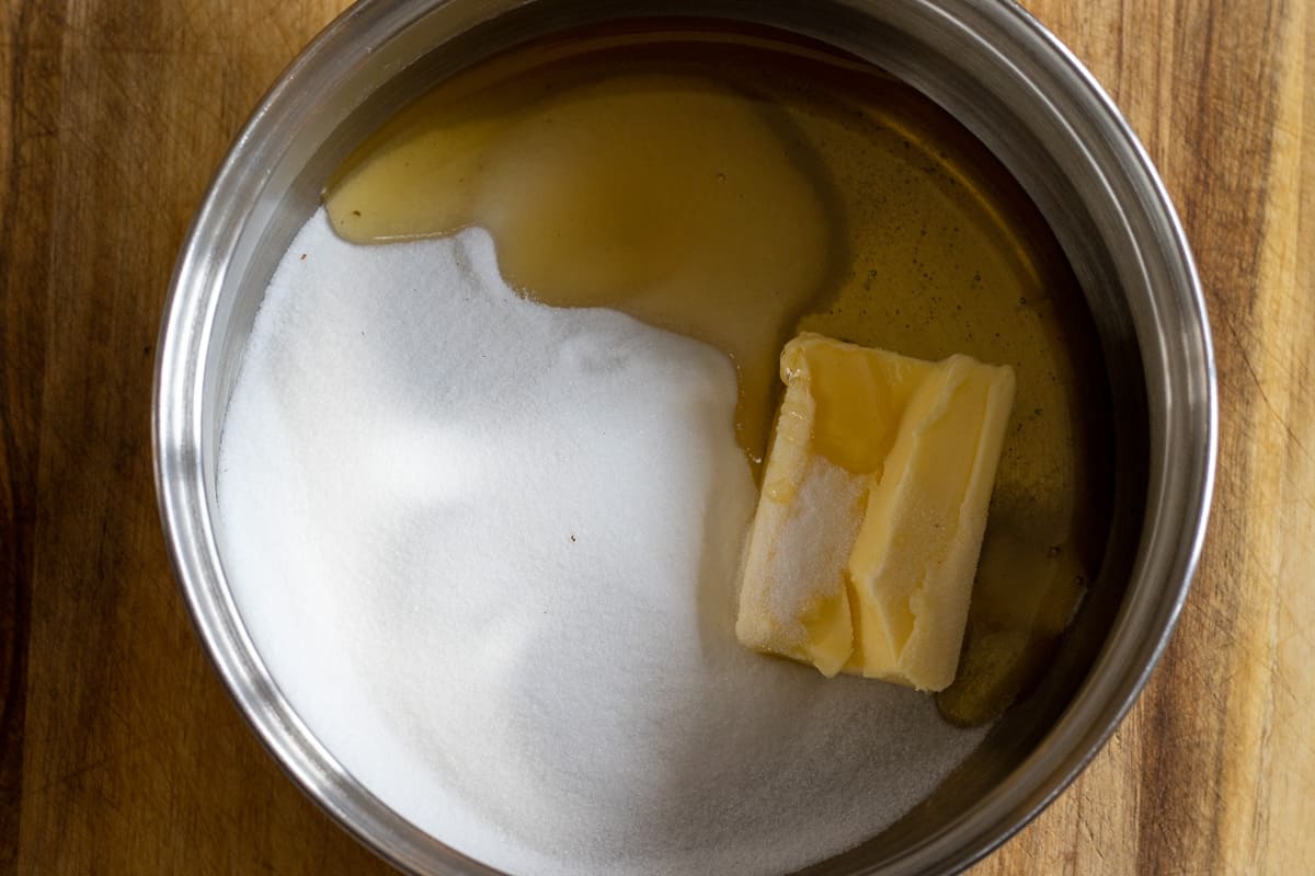 honey, butter and sugar are placed in a pan