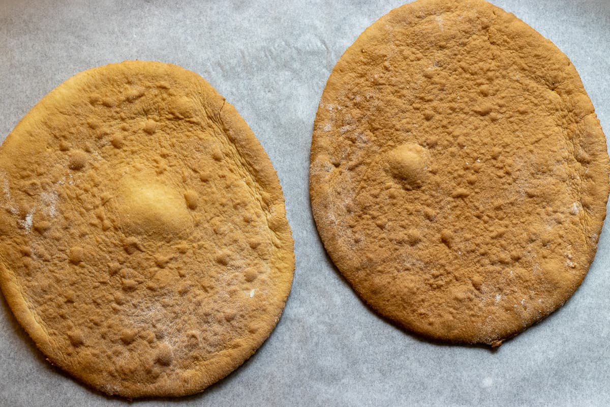 dough circles are baked until golden and crispy 