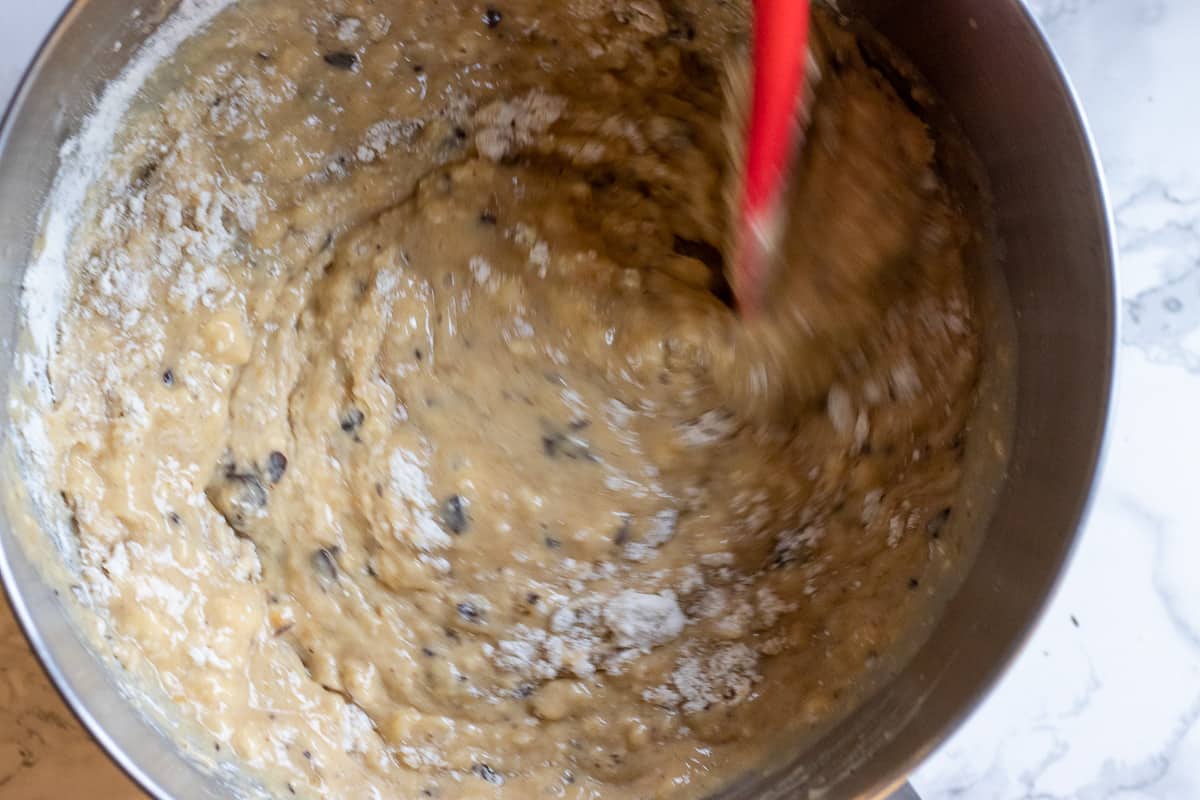 adding the flour mixture to wet ingredients
