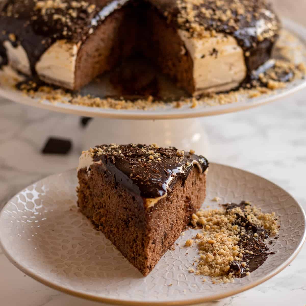 a slice of moist chocolate cream cake
