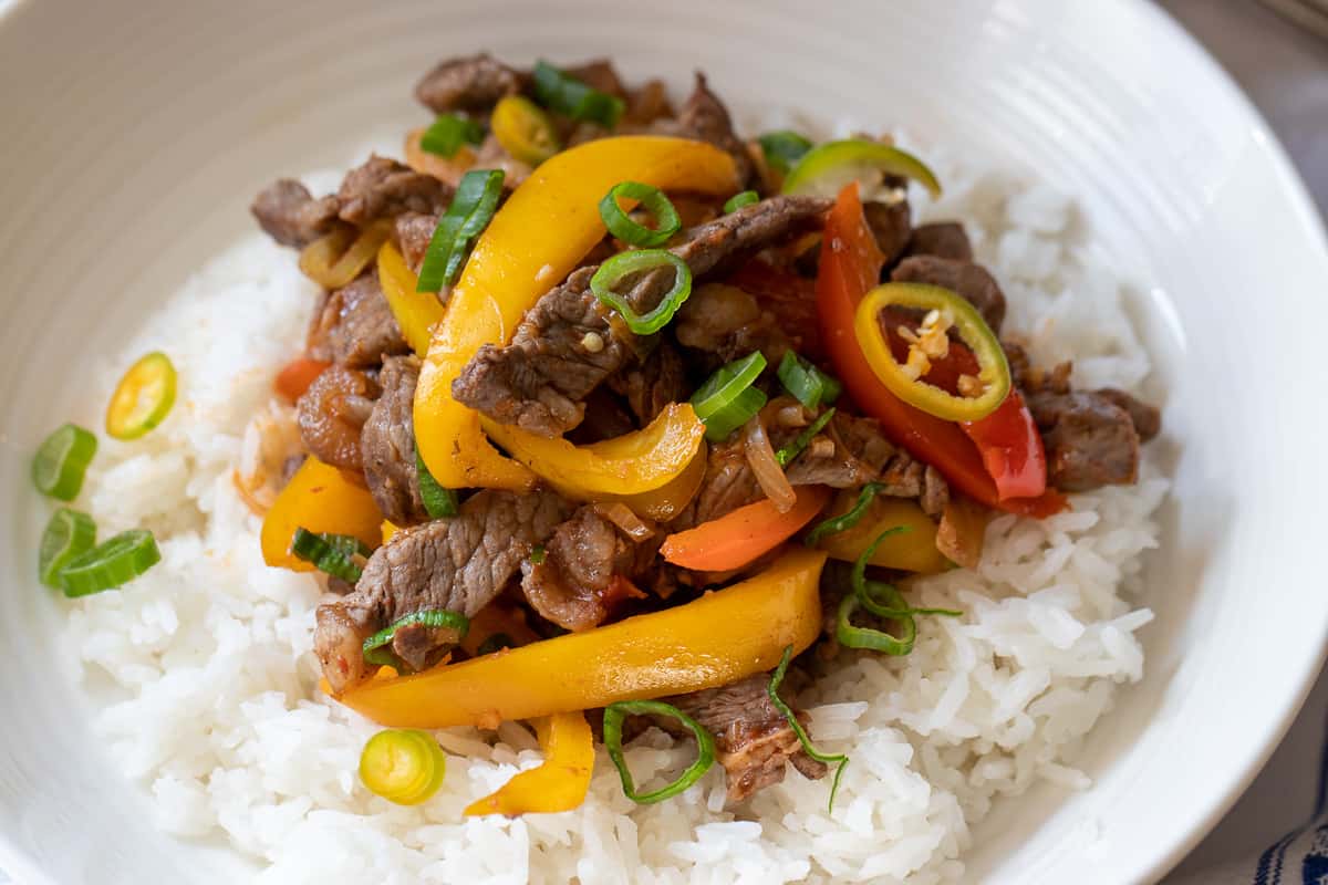 colourful Jamaican style pepper steak served on rice