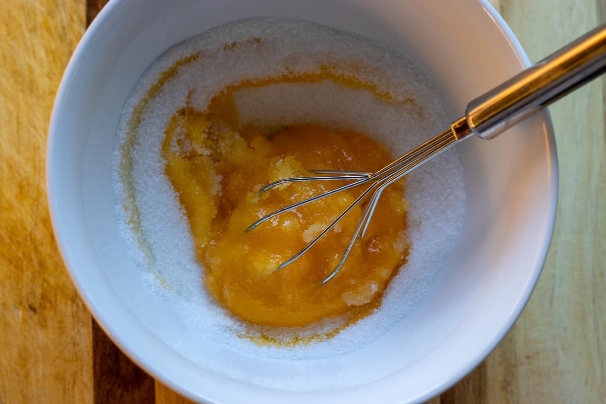 mix the eggs with sugar in a bowl
