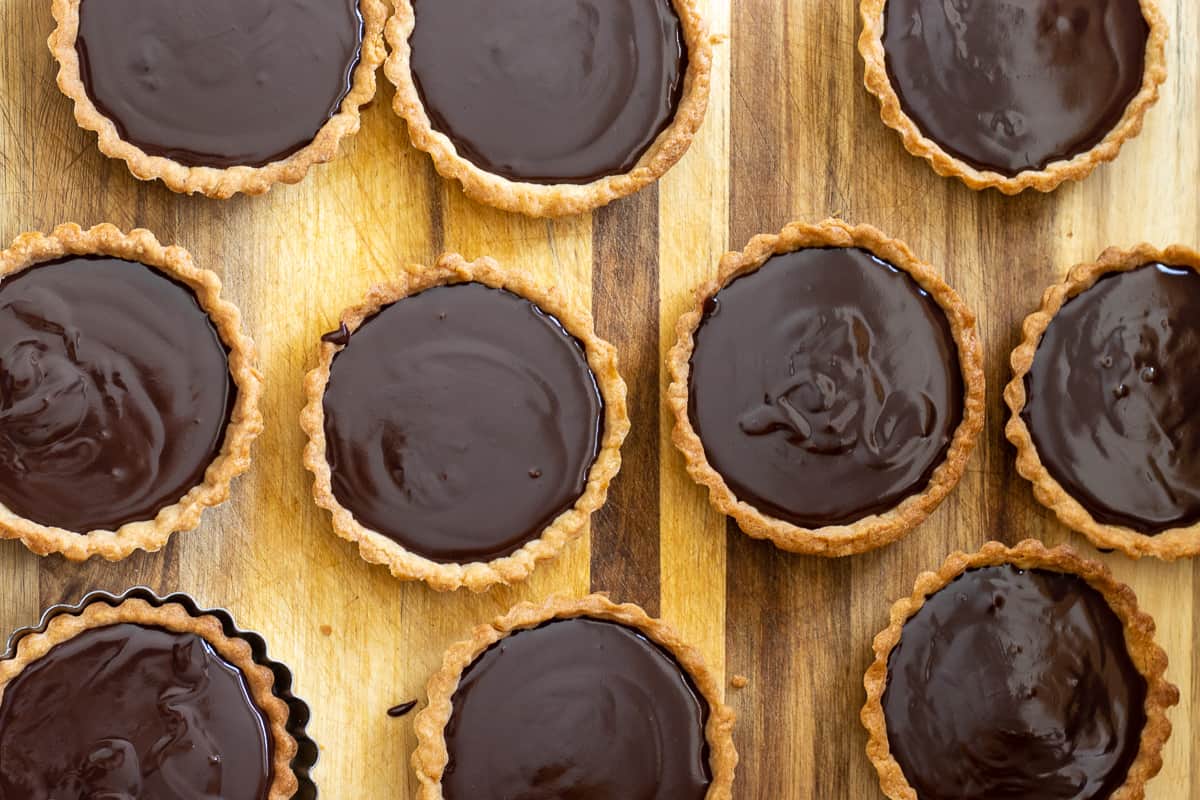 the tartlet shells are filled with Chocolate ganache