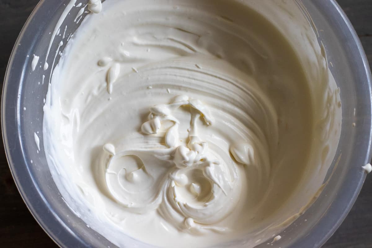 the cream is whipped until it forms stiff peaks
