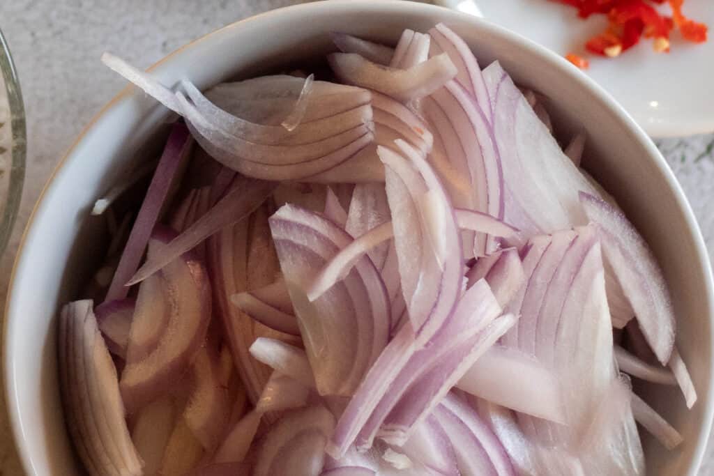 thinly sliced onions for bhaji