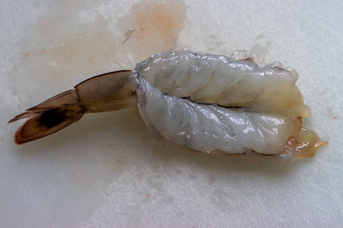 a peel shrimped deveined and butterflied