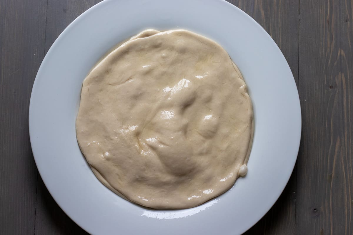 two dough circles layered with softened butter in between