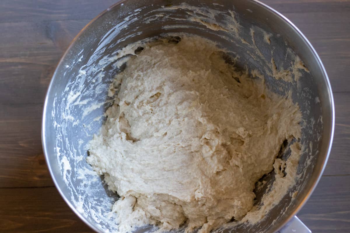 the flour, salt and olive oil is added to form a dough