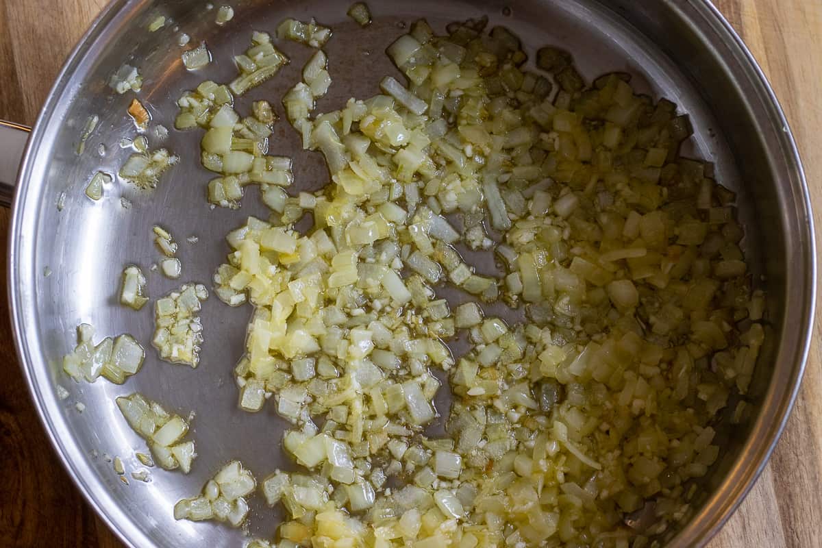 sautéing the onions with ghee in a pan