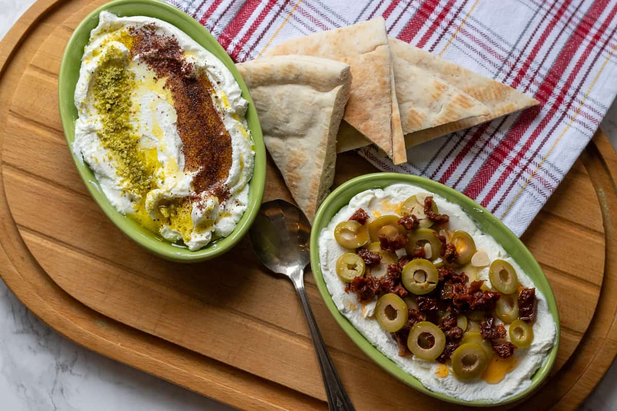 homemade labneh cheese served on 2 plates as a dip