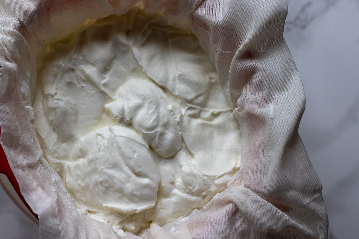 drained yogurt is transformed to creamy labneh cheese