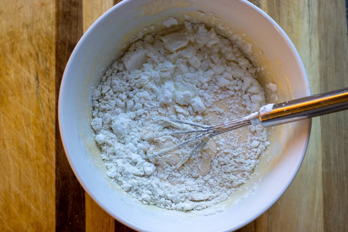 add the flour and cornflour to egg mixture