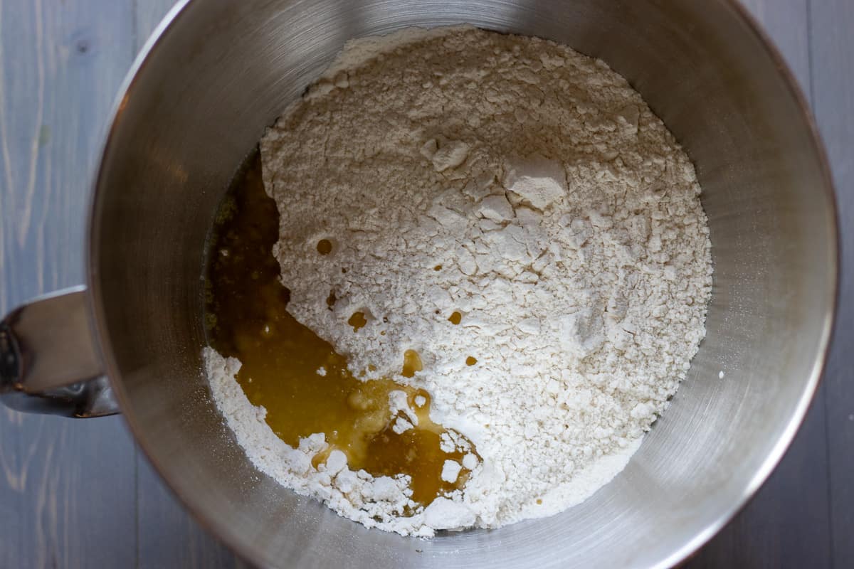 flour, salt, and olive oil are placed in a bowl