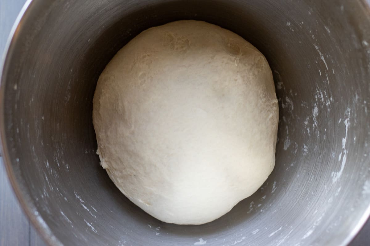 the dough for bouillon in a bowl before rising