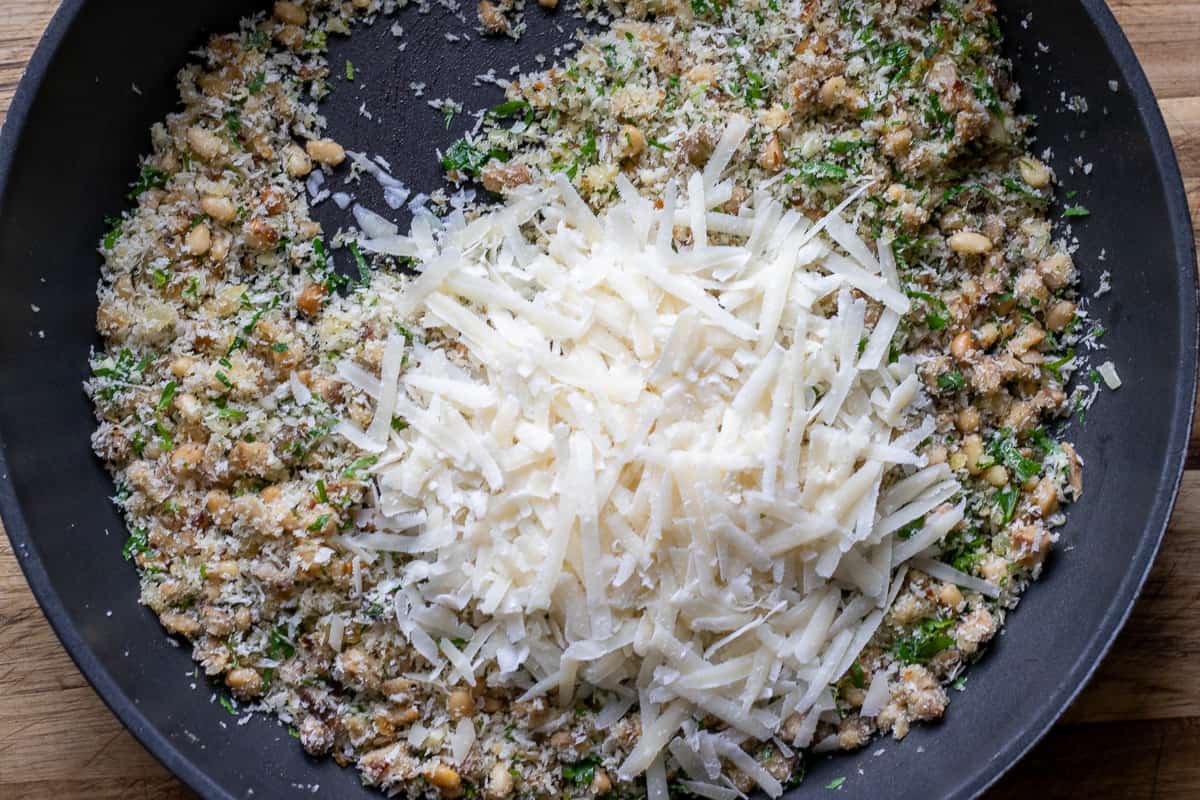 grated parmesan is added to the stuffed vegetarian mushroom filling