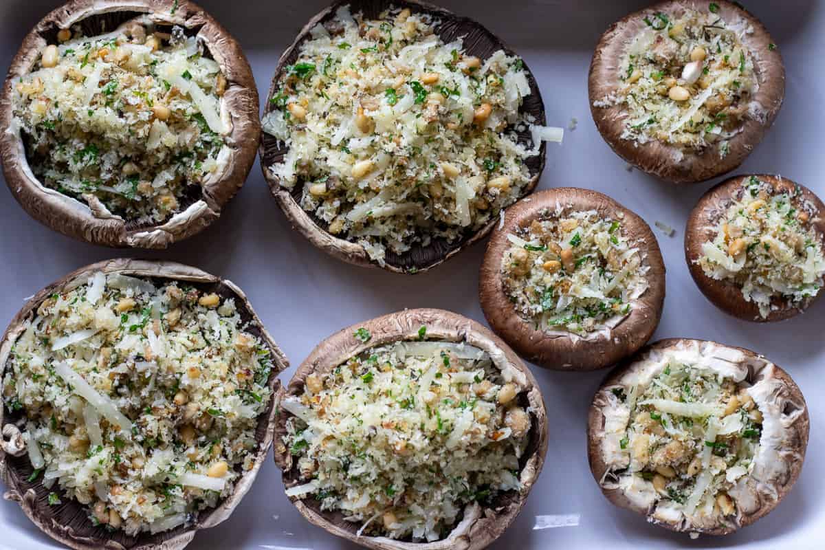 mushrooms are stuffed with filling