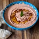 spicy greek feta dip served in a bowl with pita bread