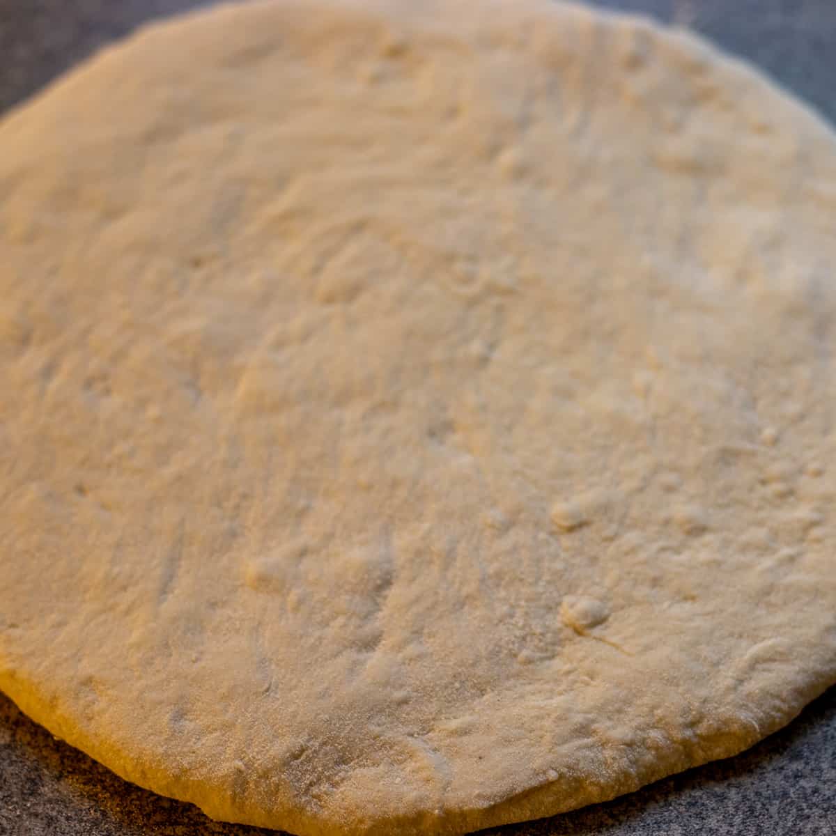 Bazlama dough is rolled into a 20 cm circle