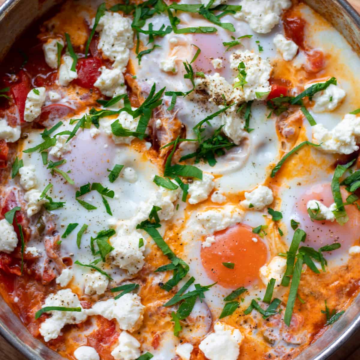 Traditional Shakshuka served with feta and herbs