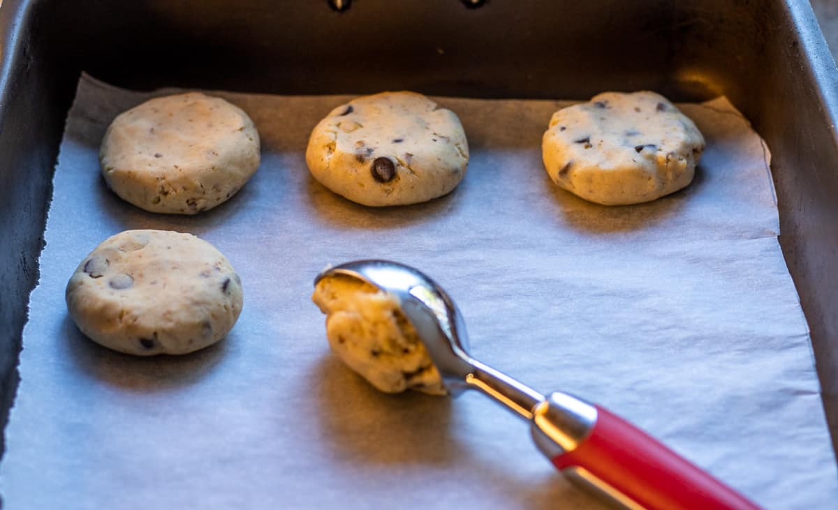 shaping the cookies with an ice cream scoop