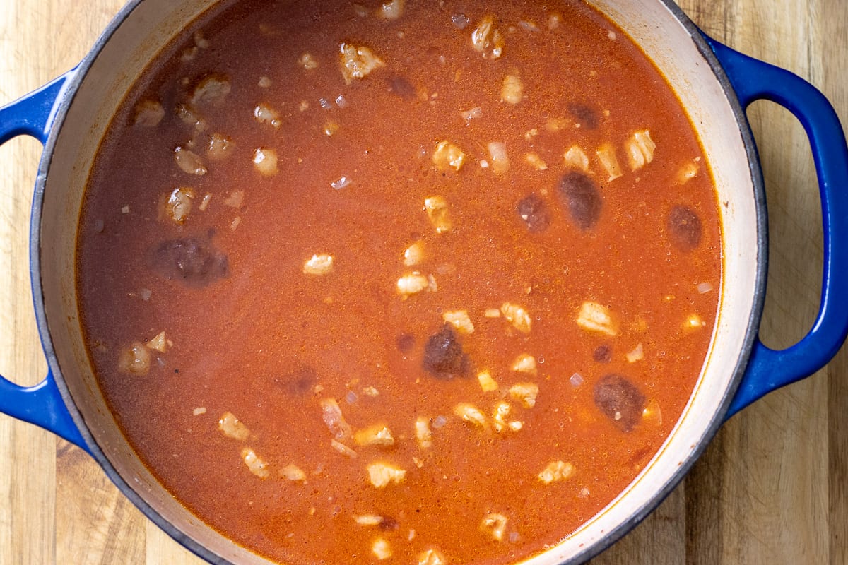 tomato passata and stock are added to the pan