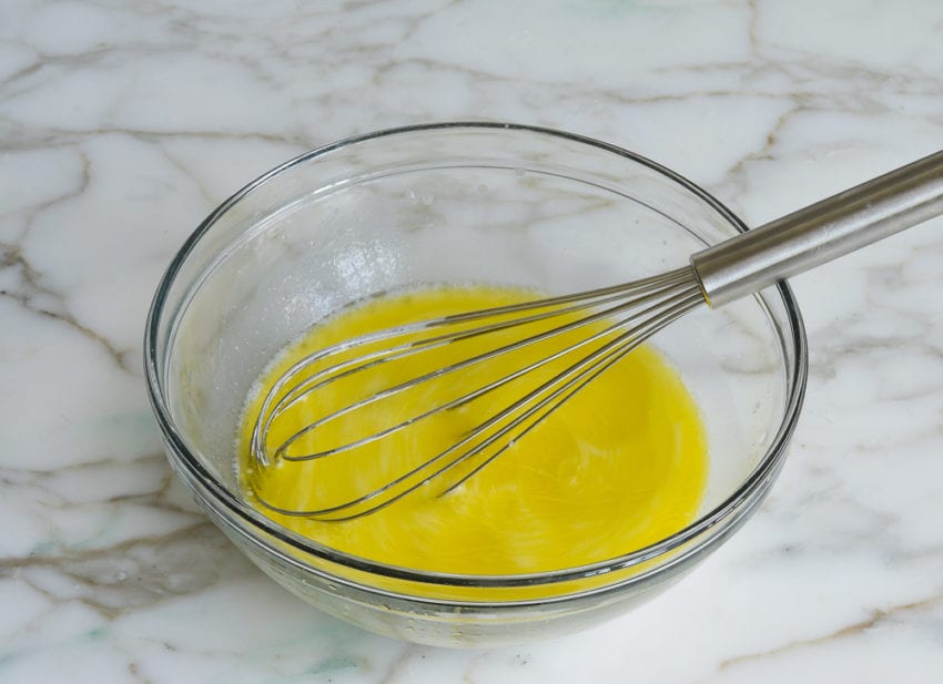 Whisk in a bowl of olive oil.