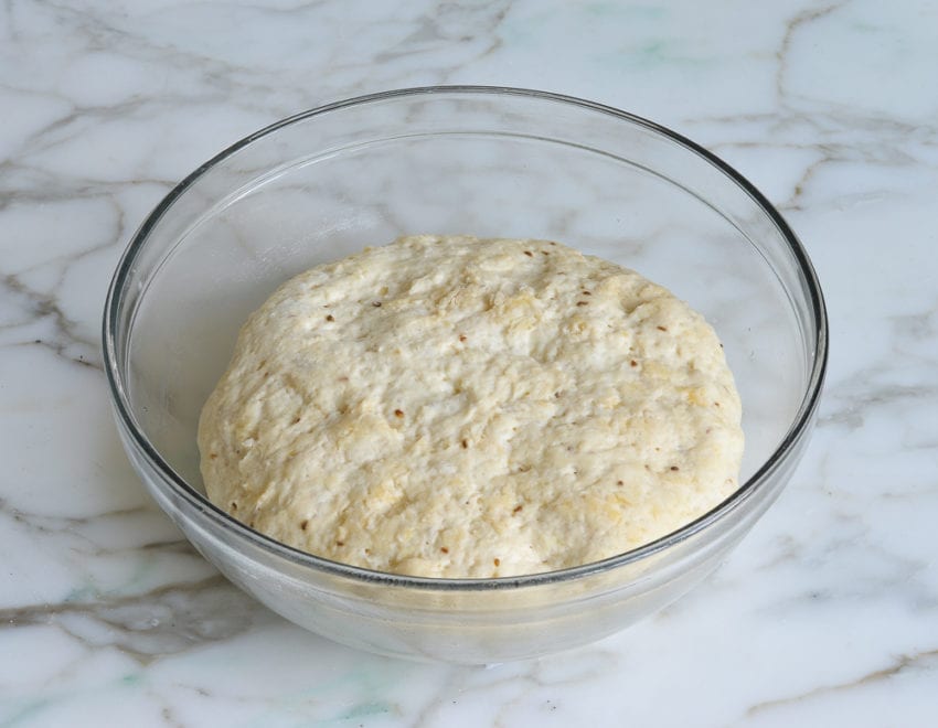 Bowl of risen dough.