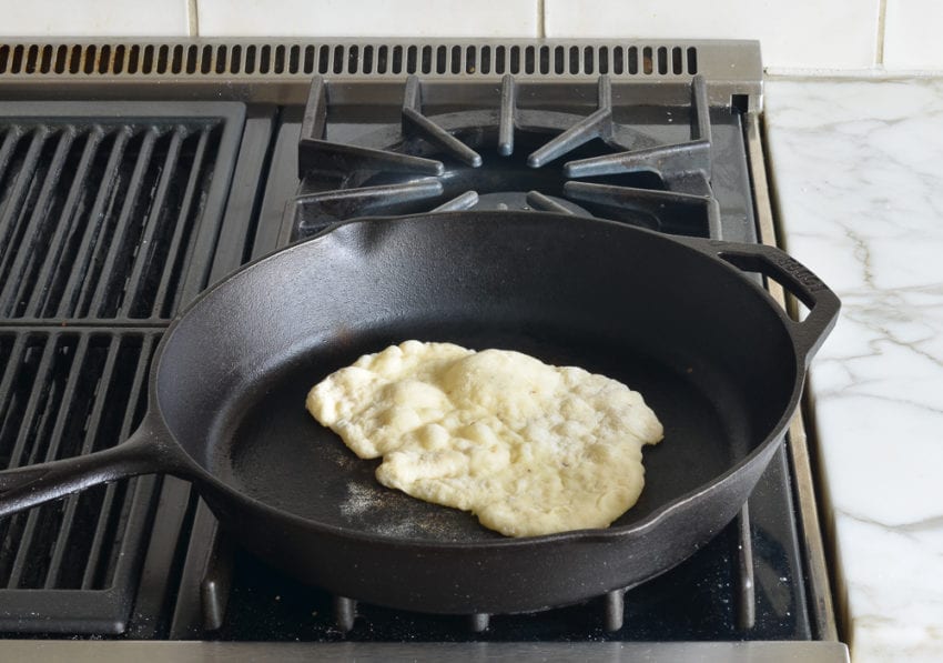 Puffed dough on a skillet.
