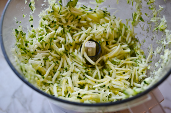 Food processor of shredded zucchini.