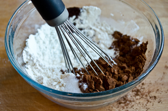 Whisk in a bowl of unmixed dry ingredients.